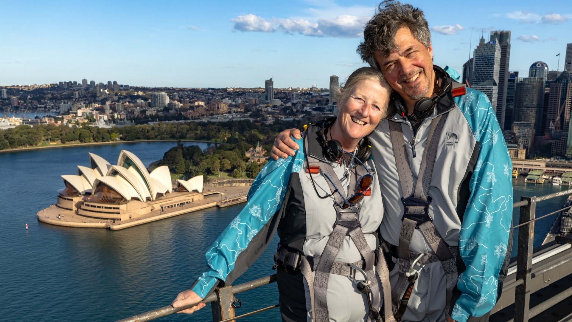 Friends_Couple_Older_Summit_Climb_Landscape_2024_BridgeClimbSydney